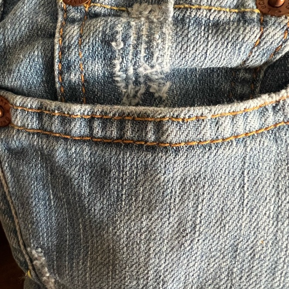 Lucky brand jeans. Size 4 length 27. Slightly distressed and flared - Picture 4 of 9